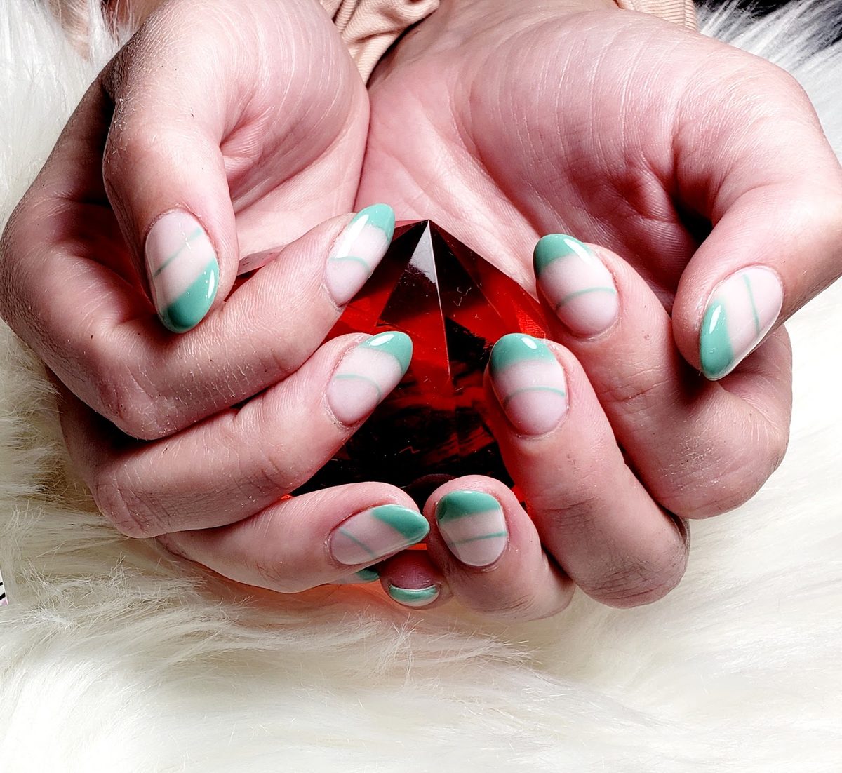 Mint green French tips with fine curved lines