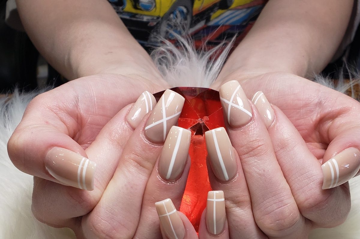 Nude square nails with crisp white line art