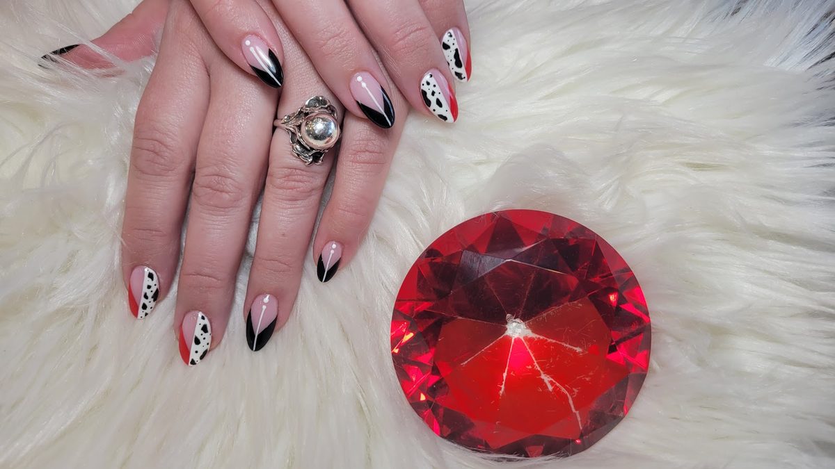 Black French tips with red and spotted accents